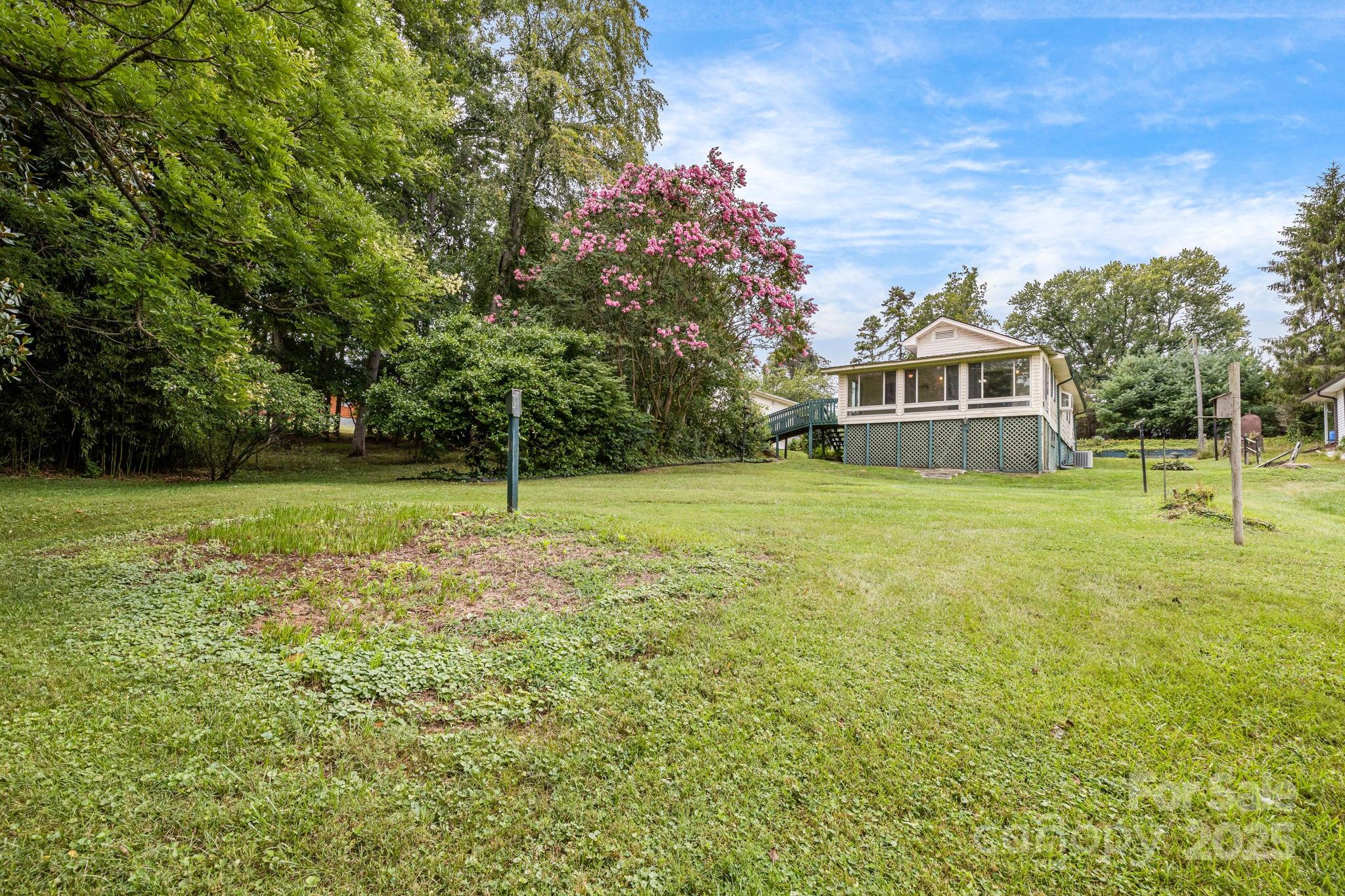 141 Macedonia Road Asheville, NC 28804 - Photo 31 of 33 a view of a house with a yard