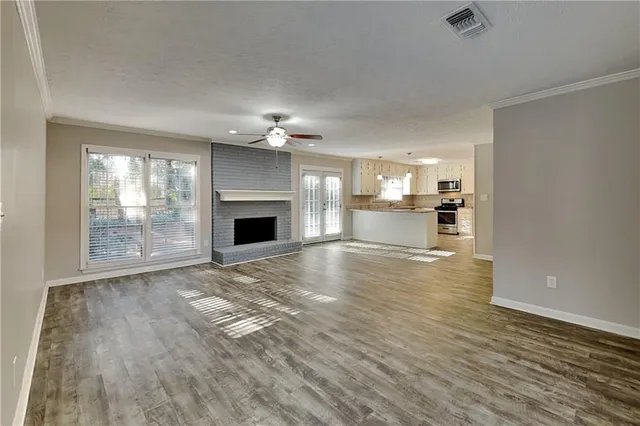 a view of a kitchen with a stove cabinets and a kitchen