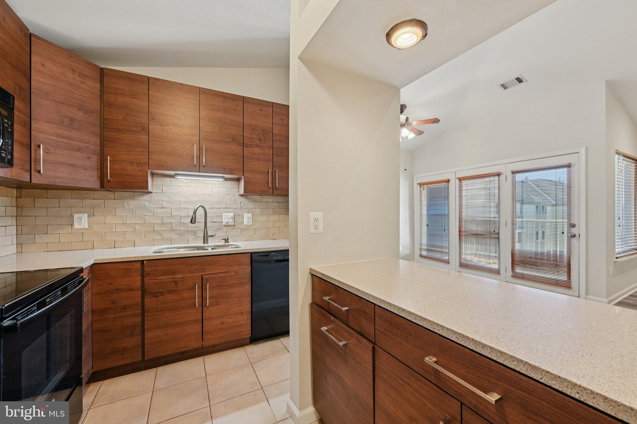 2104 Whitehall Road, Unit 2B Frederick, MD 21702 - Photo 16 of 37 a kitchen with a sink and cabinets