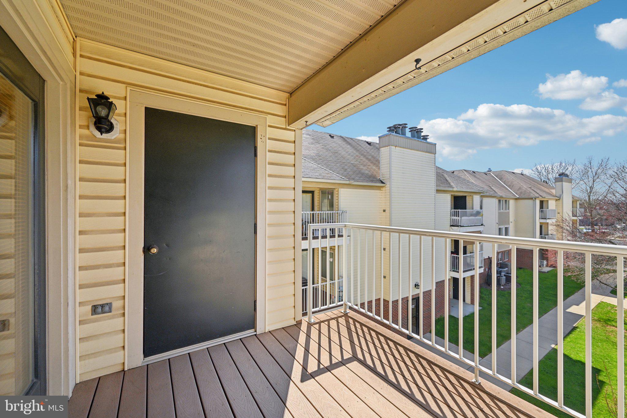 2104 Whitehall Road, Unit 2B Frederick, MD 21702 - Photo 32 of 37 a view of a balcony with wooden floor
