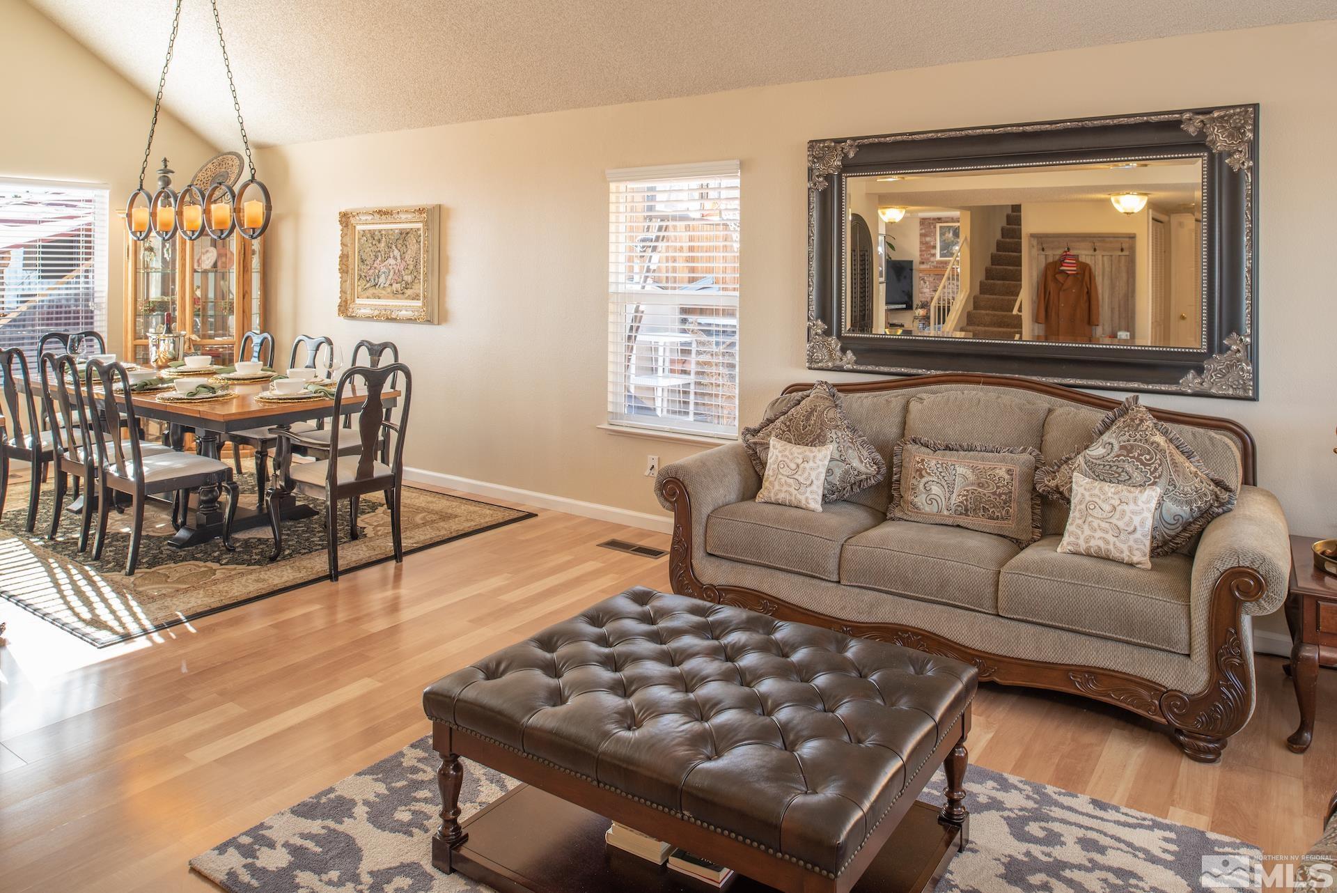 3836 Bexley Square Reno, NV 89503 - Photo 5 of 38 a living room with furniture and a large window