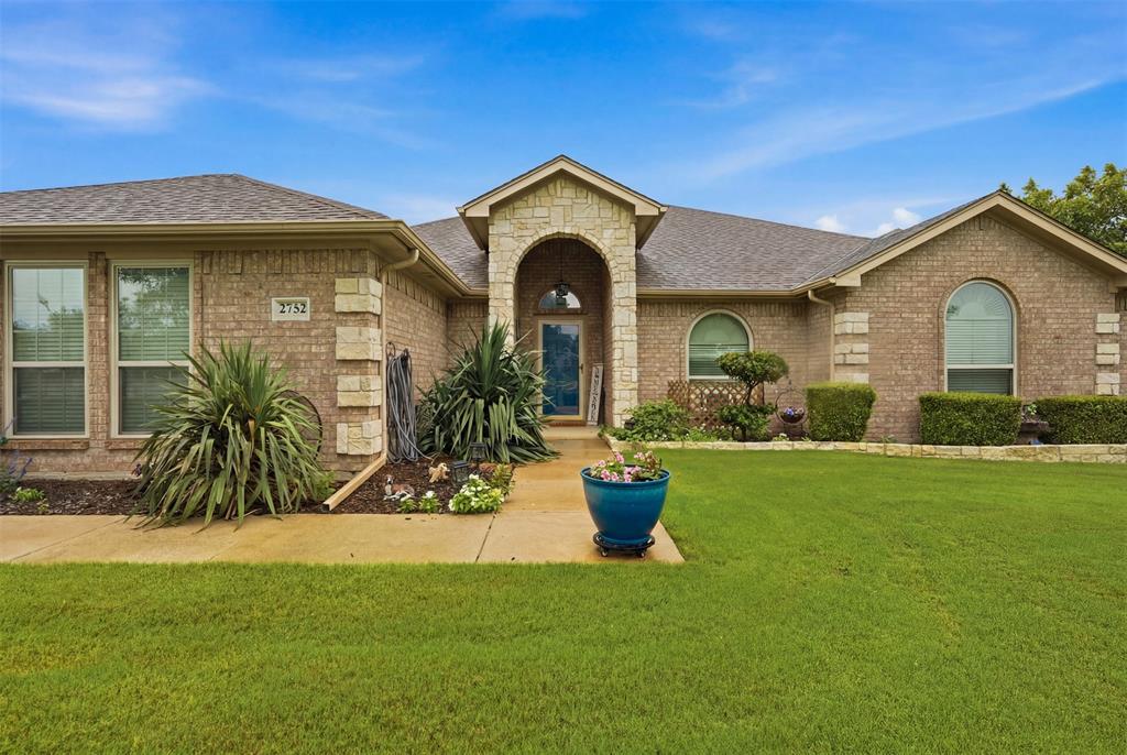 2732 Rawhide Court Haslet, TX 76052 - Photo 5 of 40 Front walk and front door