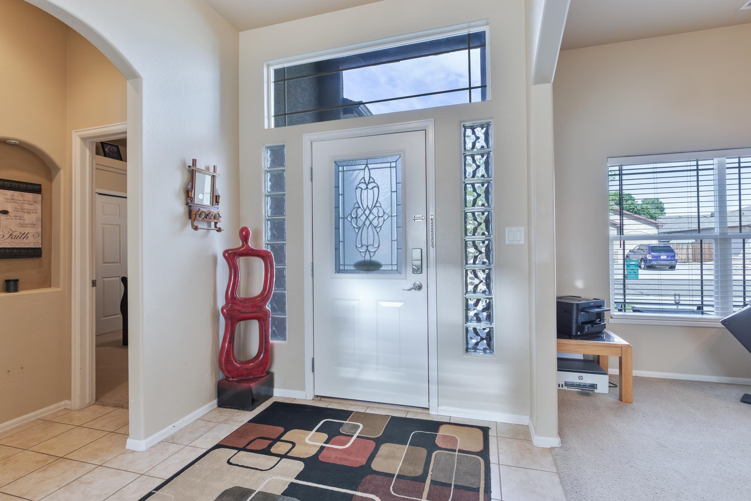 544 Hemlock Drive Fruita, CO 81521 - Photo 6 of 36 a living room with furniture and a window