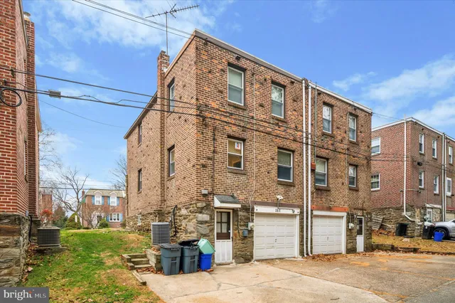 a front view of a building with street view