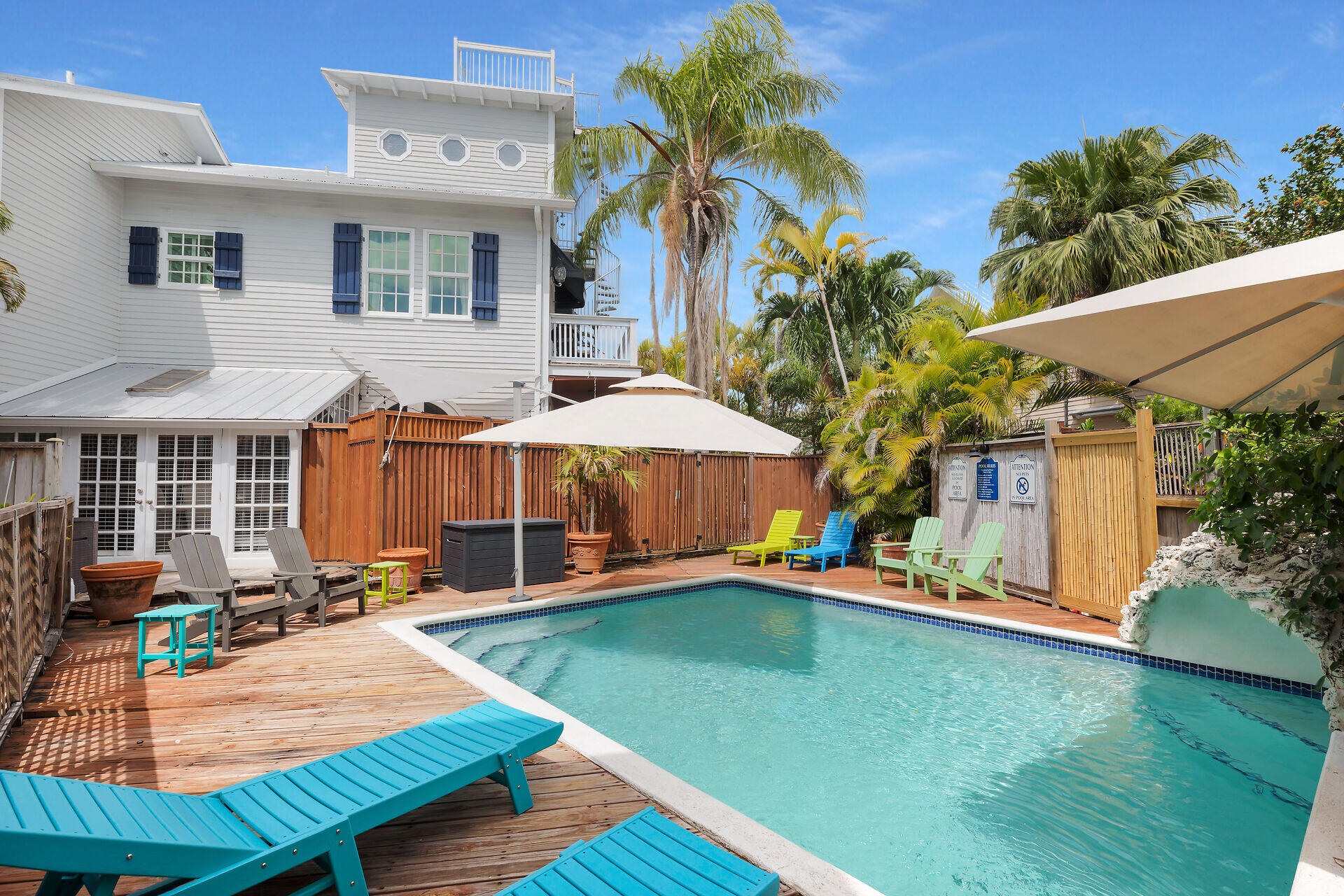 1001 United Street, Unit B Key West, FL 33040 - Photo 2 of 48 a view of a house with backyard porch and sitting area