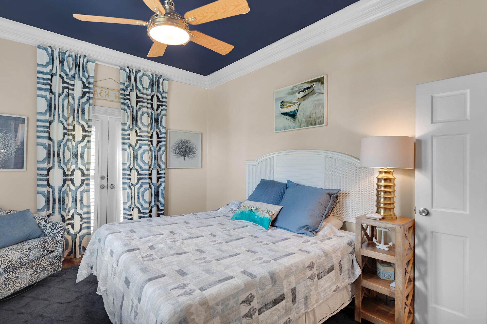 1001 United Street, Unit B Key West, FL 33040 - Photo 35 of 48 a bedroom with a bed and a chandelier