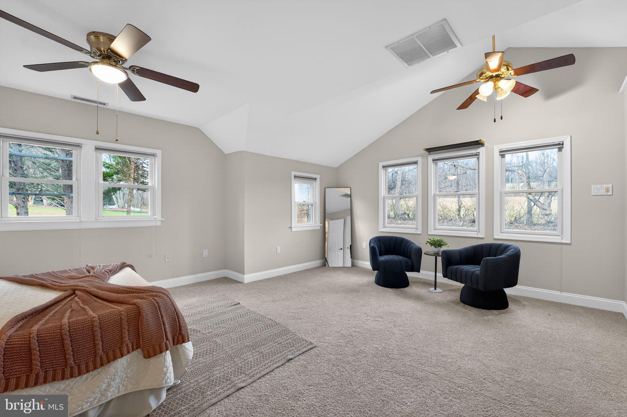 23711 Slidell Road Clarksburg, MD 20871 - Photo 15 of 31 a bedroom with a bed and a couch