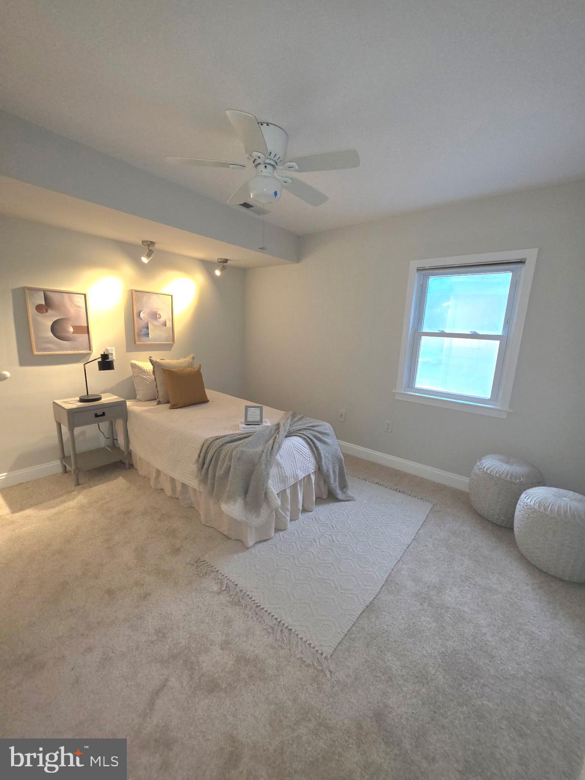 23711 Slidell Road Clarksburg, MD 20871 - Photo 18 of 31 a bedroom with a bed and window