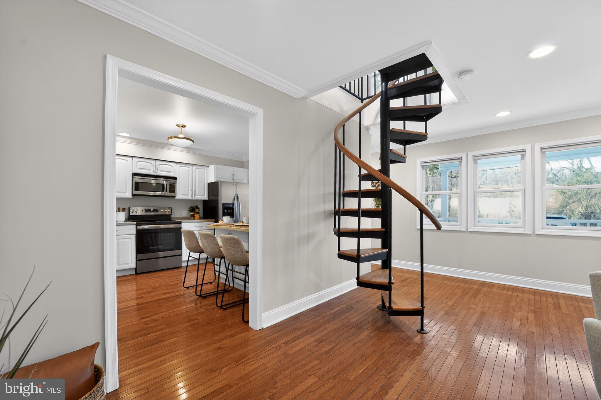 23711 Slidell Road Clarksburg, MD 20871 - Photo 24 of 31 a view of entryway and kitchen with wooden floor