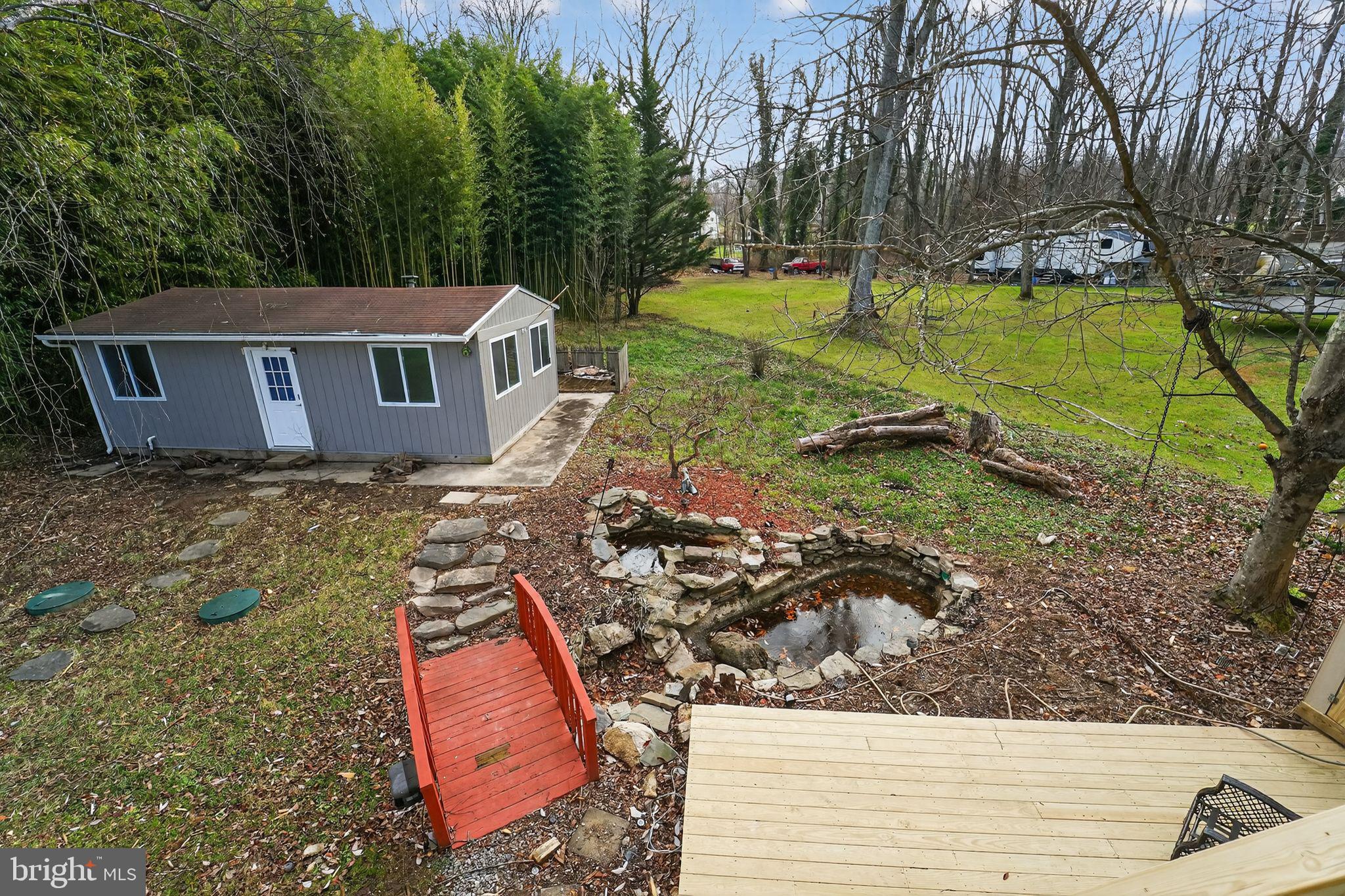23711 Slidell Road Clarksburg, MD 20871 - Photo 28 of 31 a view of a house with a yard
