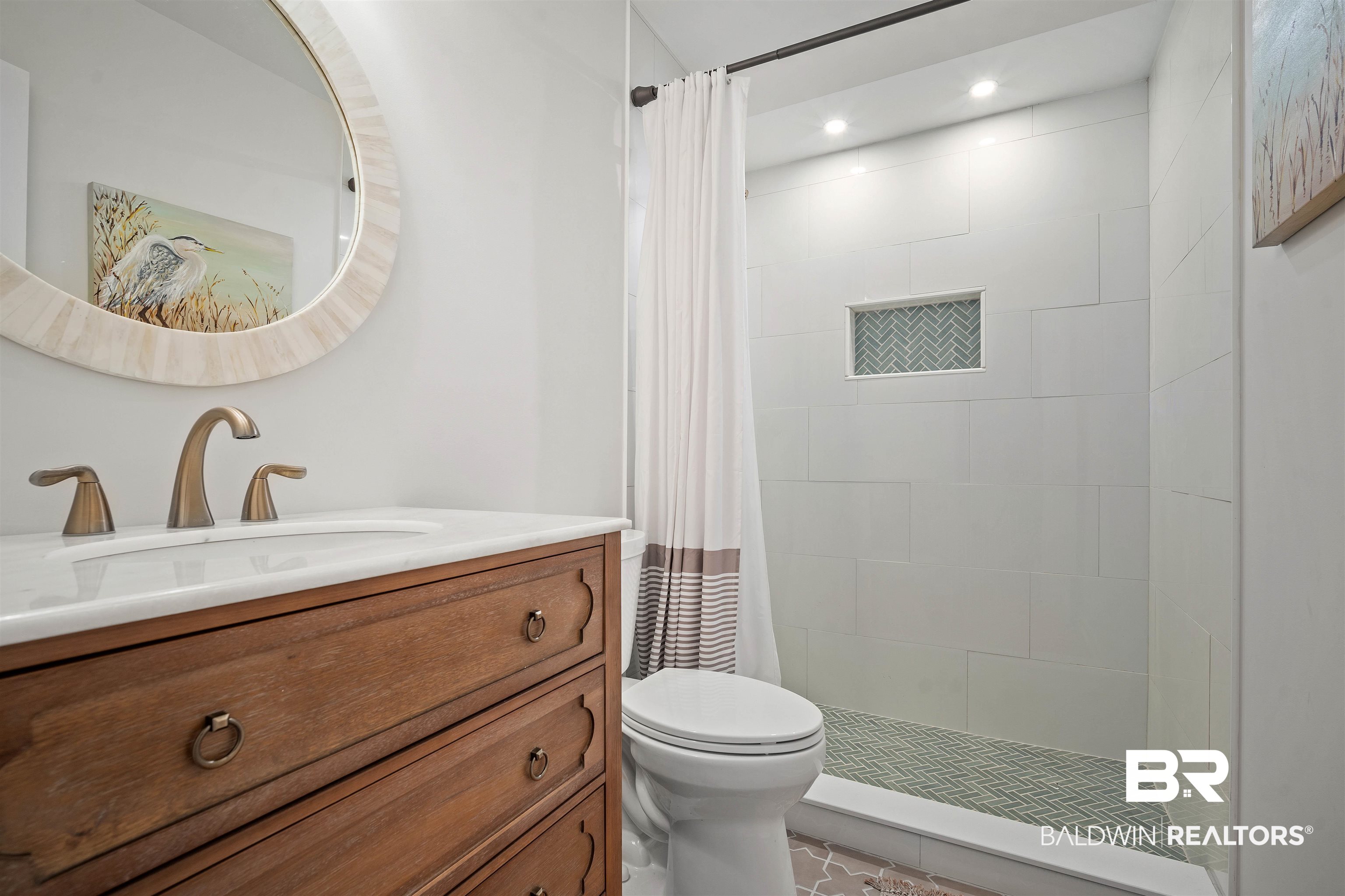 700 Eliza Jordan Road North Mobile, AL 36608 - Photo 21 of 44 Bathroom featuring vanity, recessed lighting, tiled shower, and tile patterned flooring