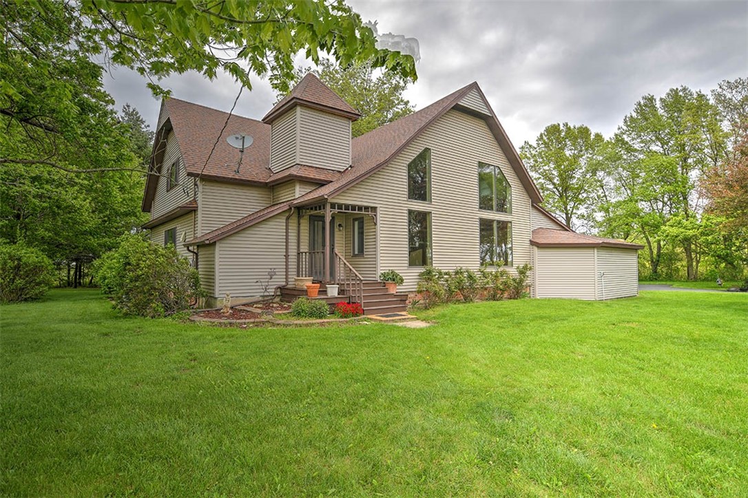 877 East 1800 North Road Assumption, IL 62510 - Photo 1 of 46 a view of a house with a yard and sitting area