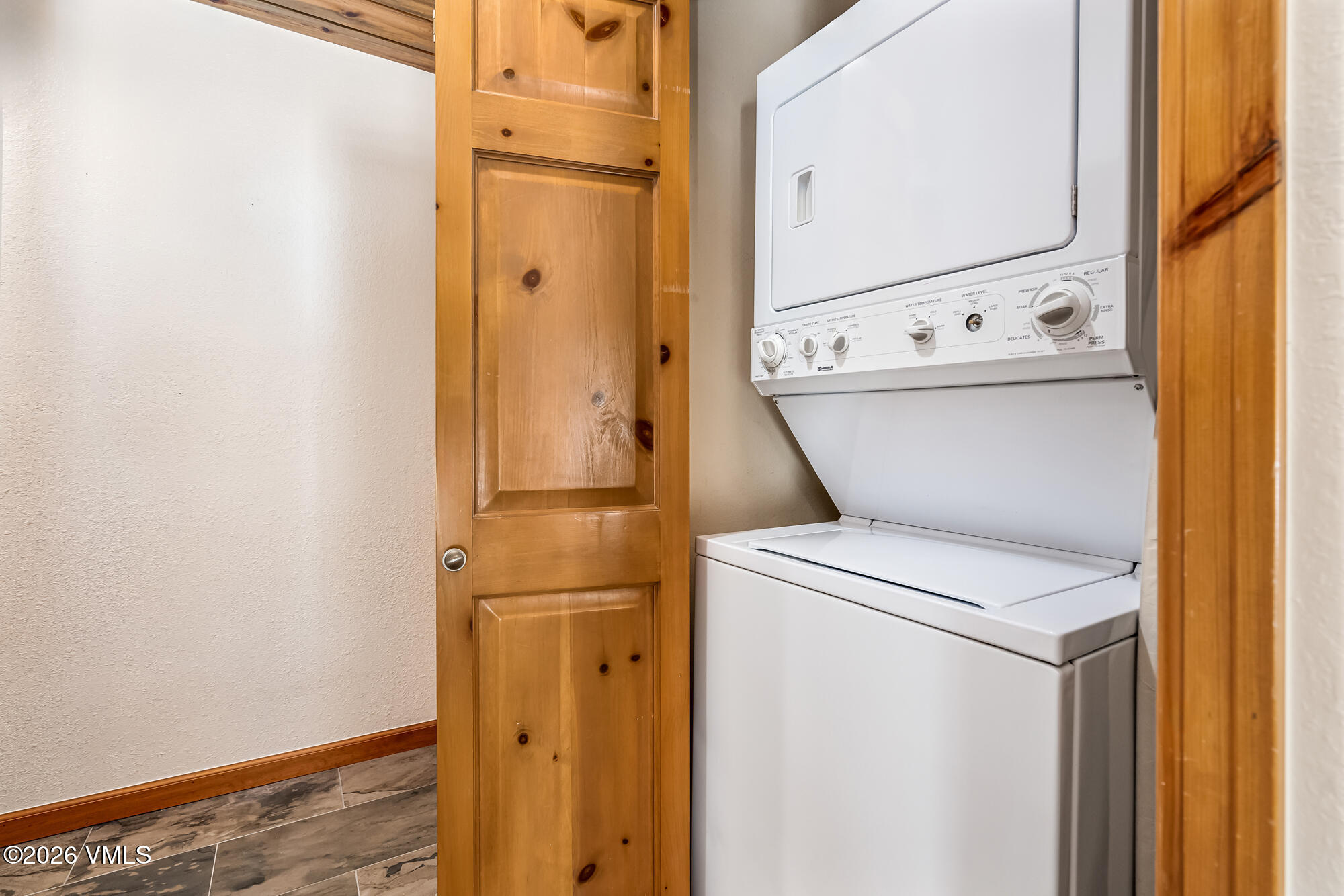 4470 Timber Falls Court, Unit 1405 Vail, CO 81657 - Photo 21 of 35 a close up of a washer and dryer