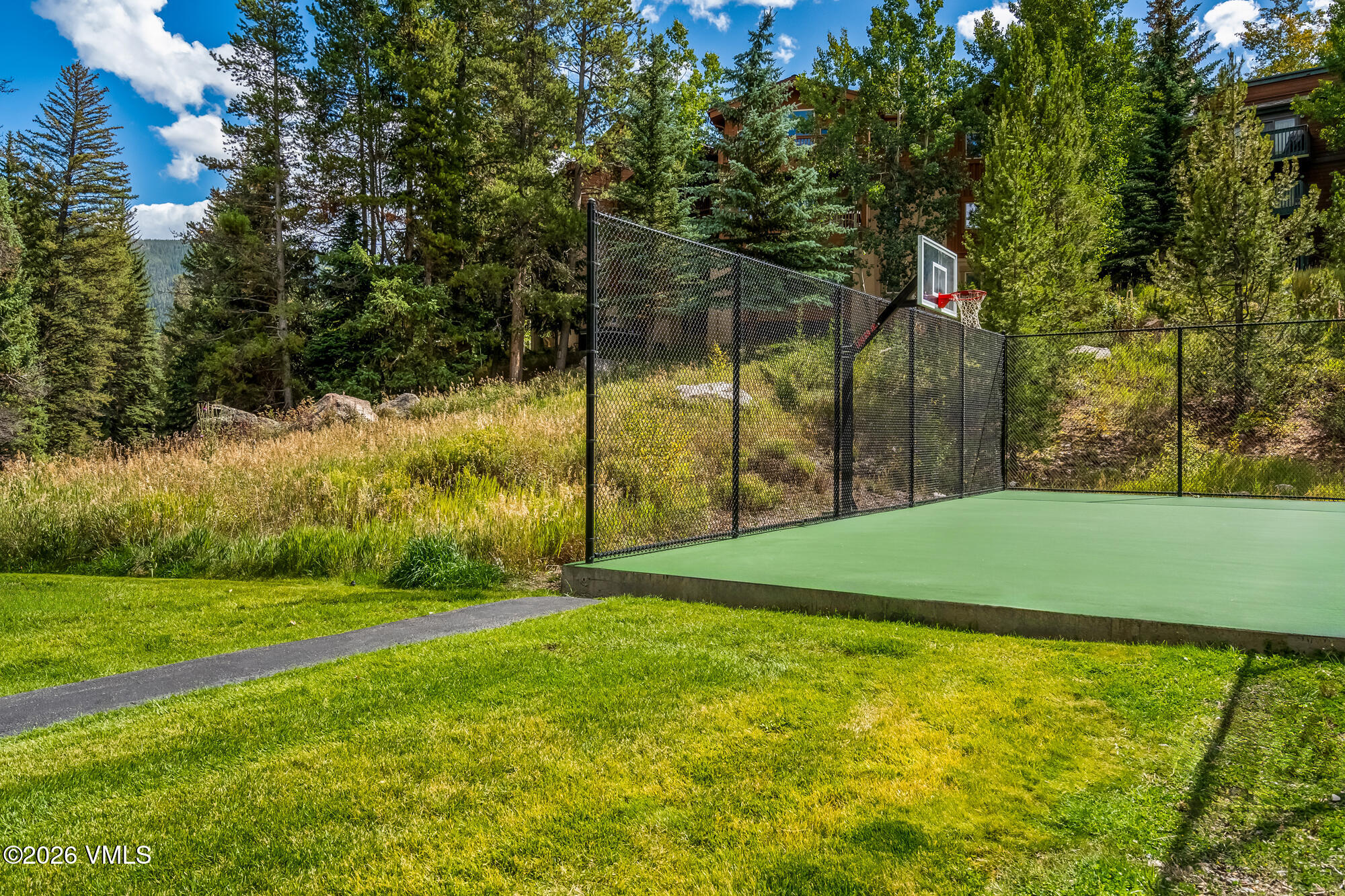 4470 Timber Falls Court, Unit 1405 Vail, CO 81657 - Photo 30 of 35 a view of green field