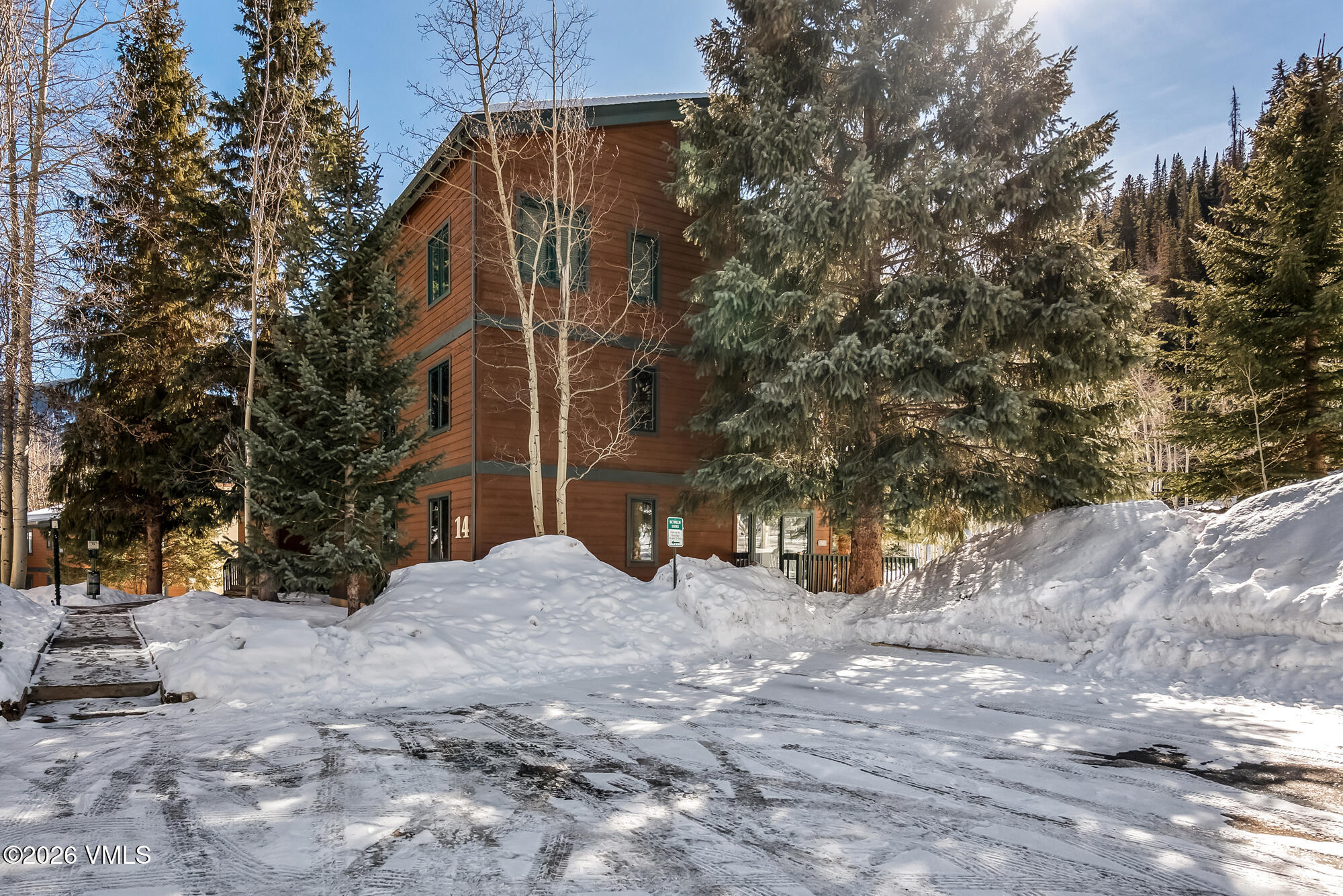 4470 Timber Falls Court, Unit 1405 Vail, CO 81657 - Photo 35 of 35 a view of large tree in front of a house