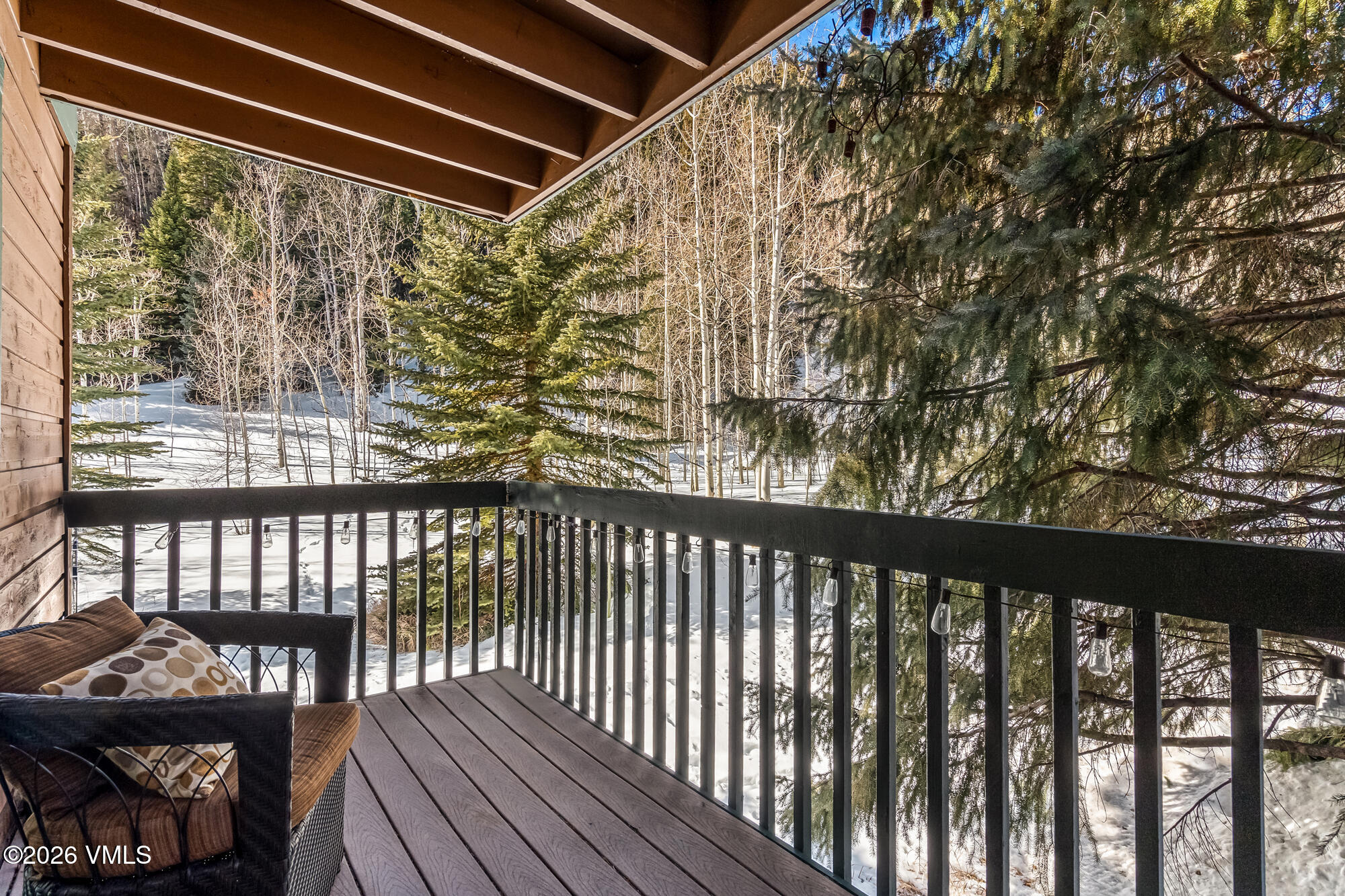 4470 Timber Falls Court, Unit 1405 Vail, CO 81657 - Photo 4 of 35 a view of a porch with wooden floor