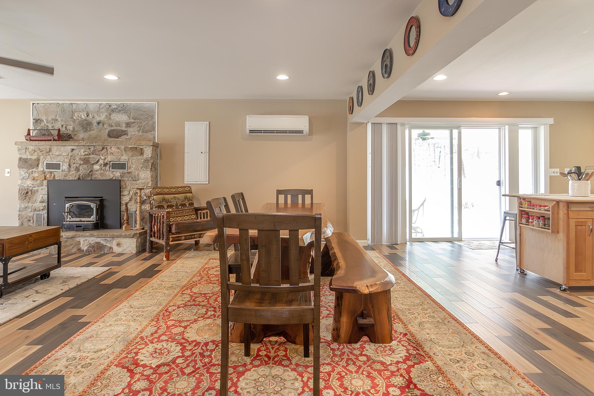 11907 Colyer Lane Shade Gap, PA 17255 - Photo 12 of 87 a living room with furniture and a fireplace