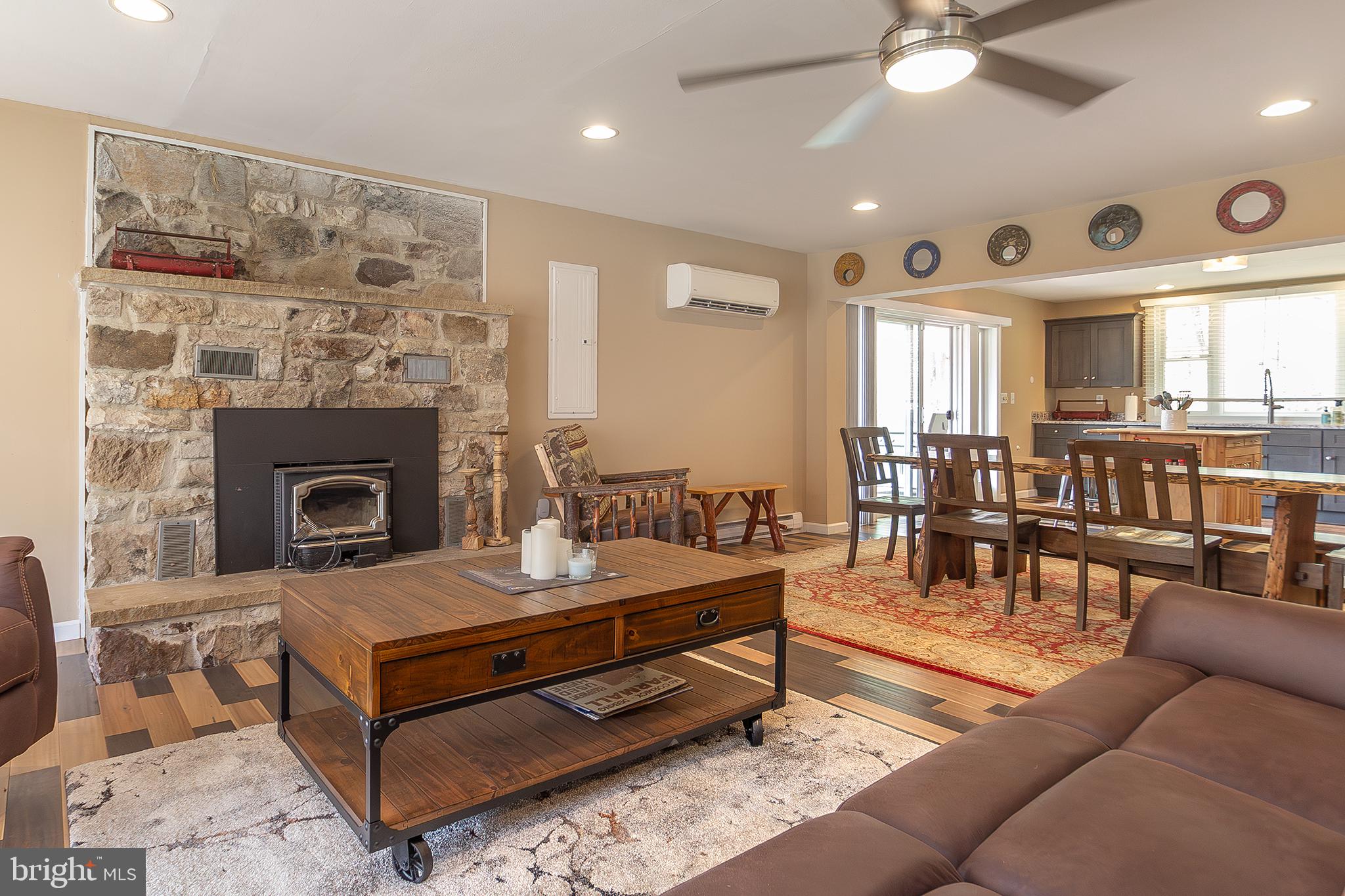 11907 Colyer Lane Shade Gap, PA 17255 - Photo 14 of 87 a living room with furniture and a fireplace