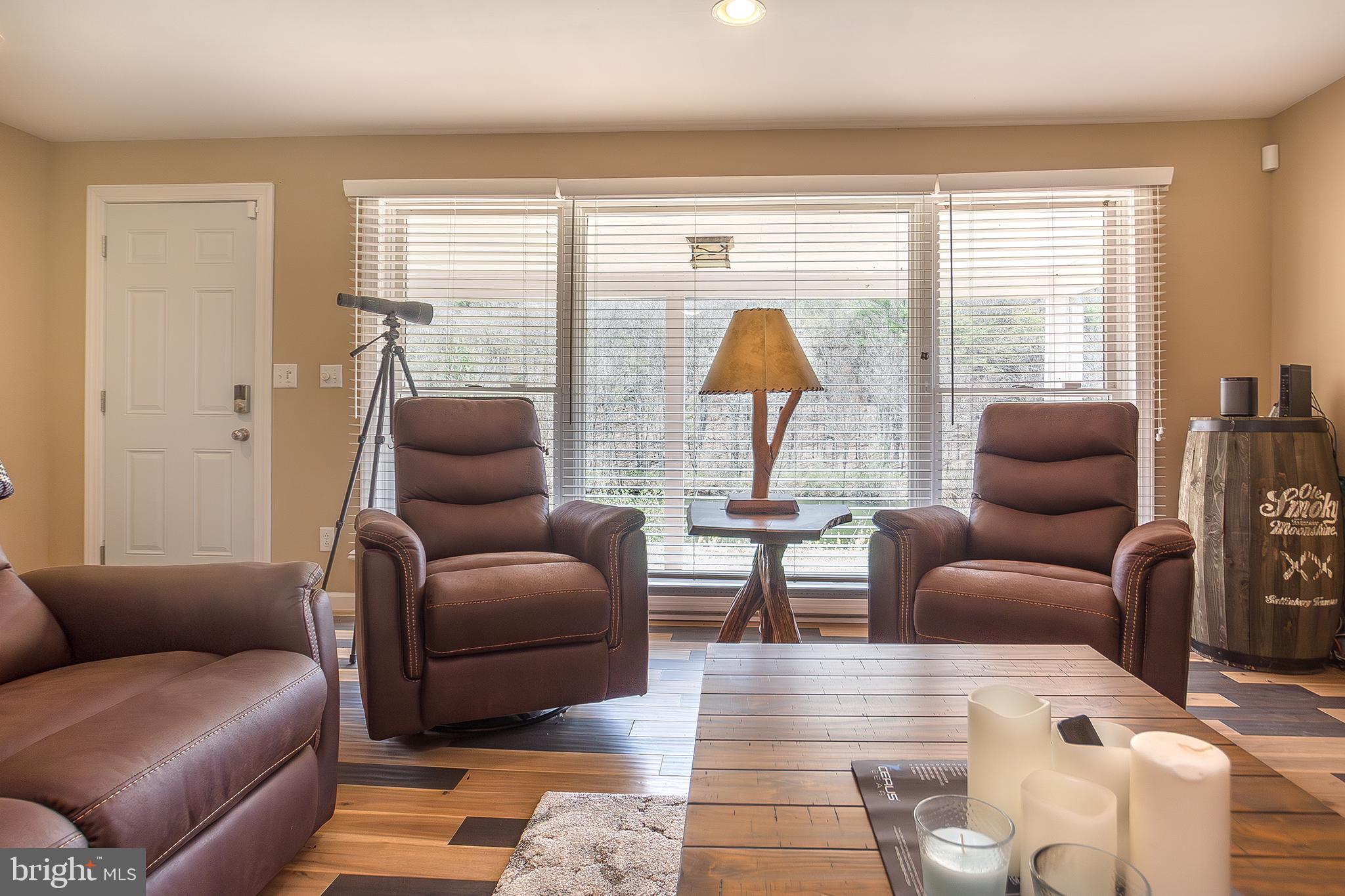 11907 Colyer Lane Shade Gap, PA 17255 - Photo 16 of 87 a living room with furniture and a large window