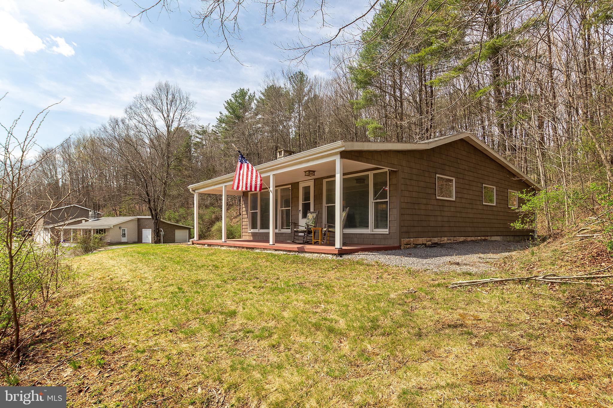 11907 Colyer Lane Shade Gap, PA 17255 - Photo 2 of 87 a front view of a house with a garden and tree