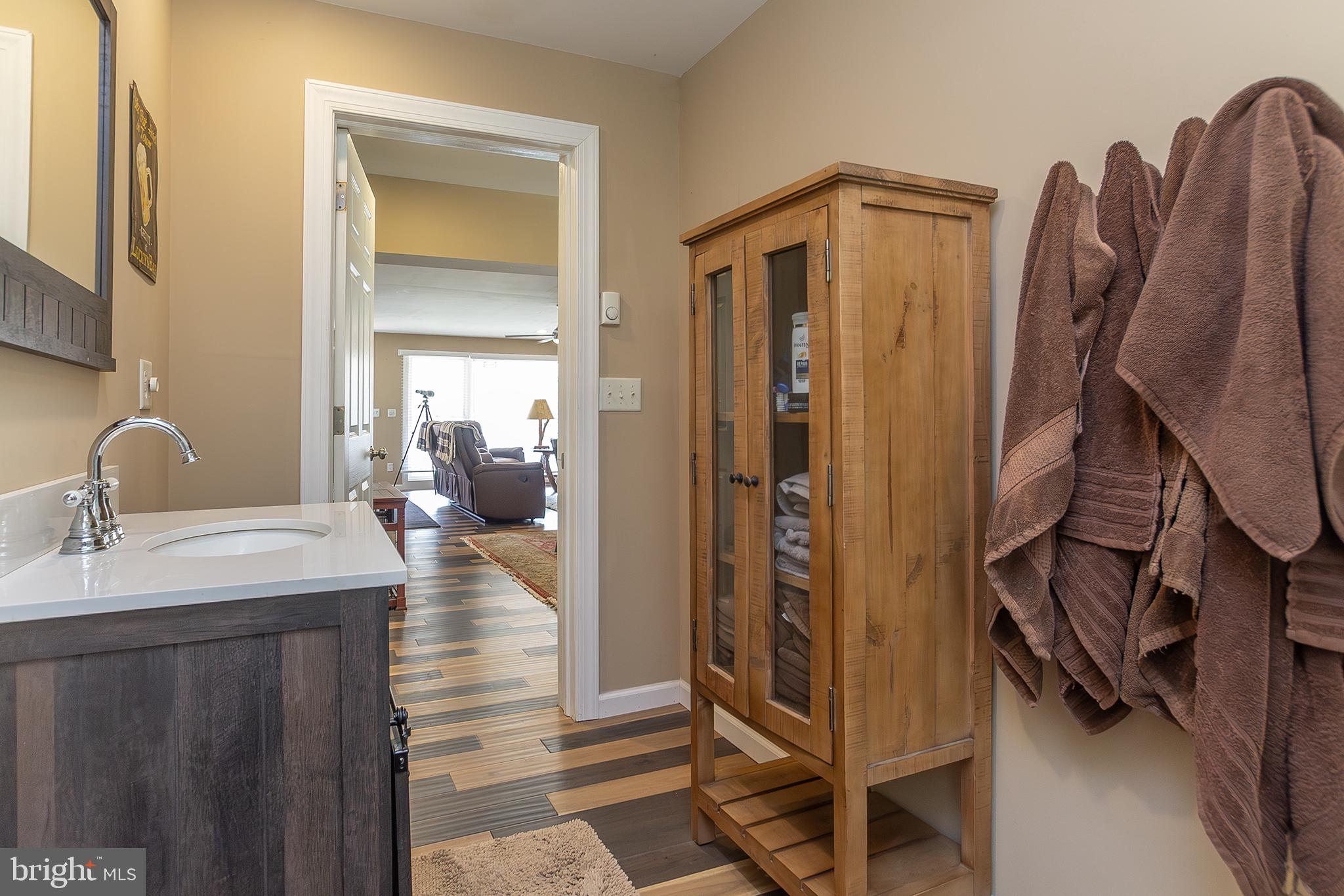 11907 Colyer Lane Shade Gap, PA 17255 - Photo 21 of 87 a en suite bathroom with a sink and mirror