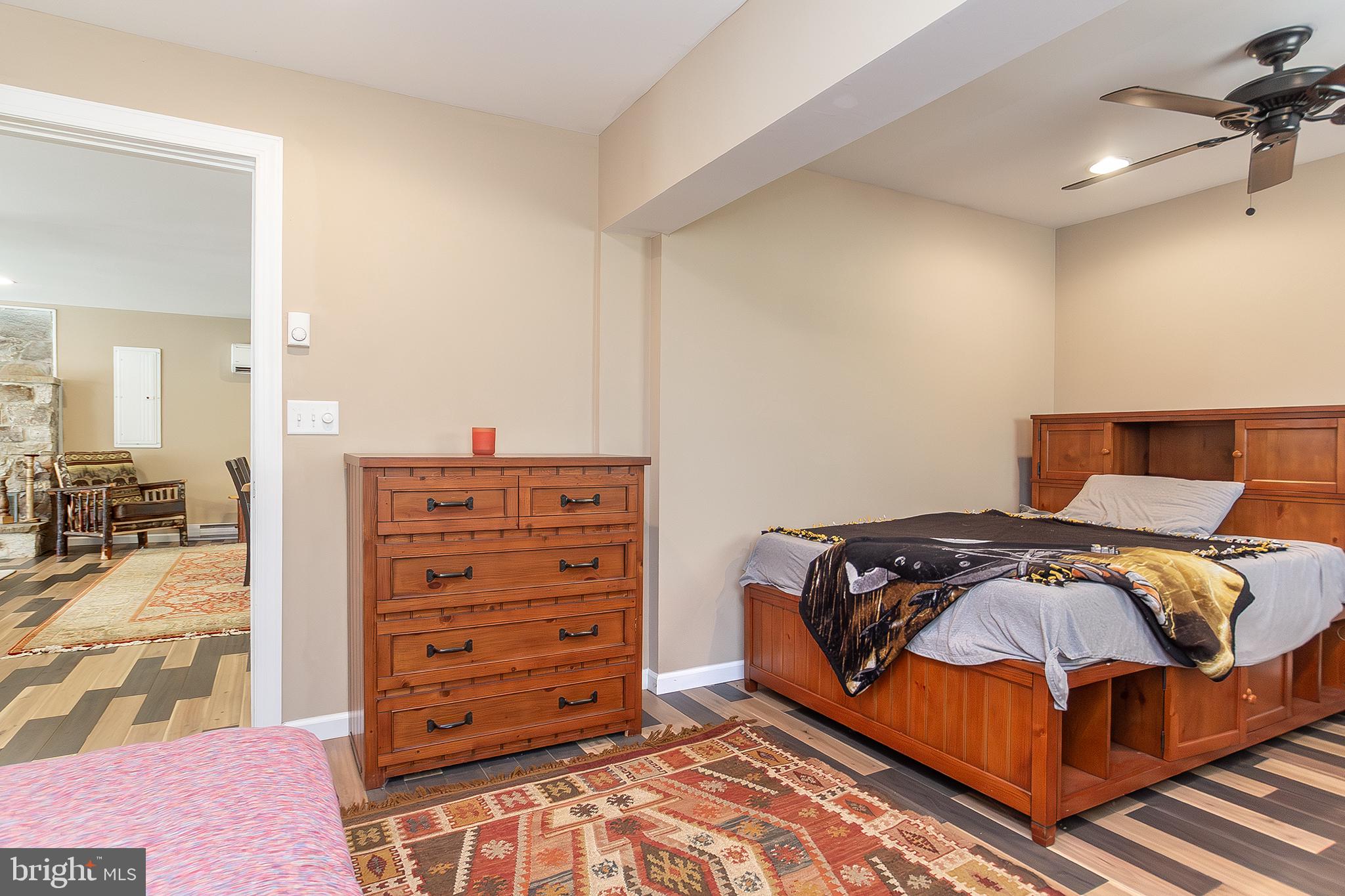 11907 Colyer Lane Shade Gap, PA 17255 - Photo 22 of 87 a bedroom with a bed and a mirror