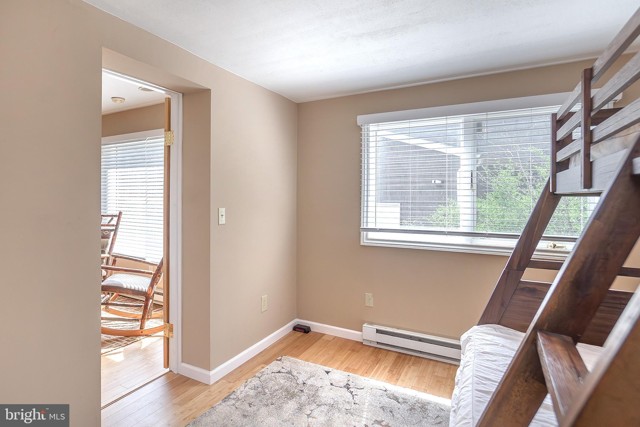 11907 Colyer Lane Shade Gap, PA 17255 - Photo 54 of 87 a view of an empty room with wooden floor and a window