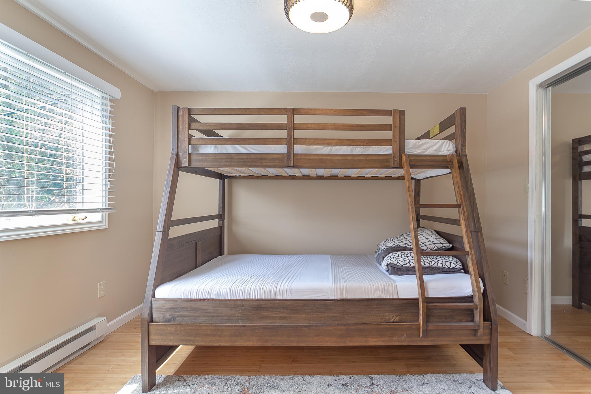 11907 Colyer Lane Shade Gap, PA 17255 - Photo 55 of 87 a bedroom with a bunk bed and a window