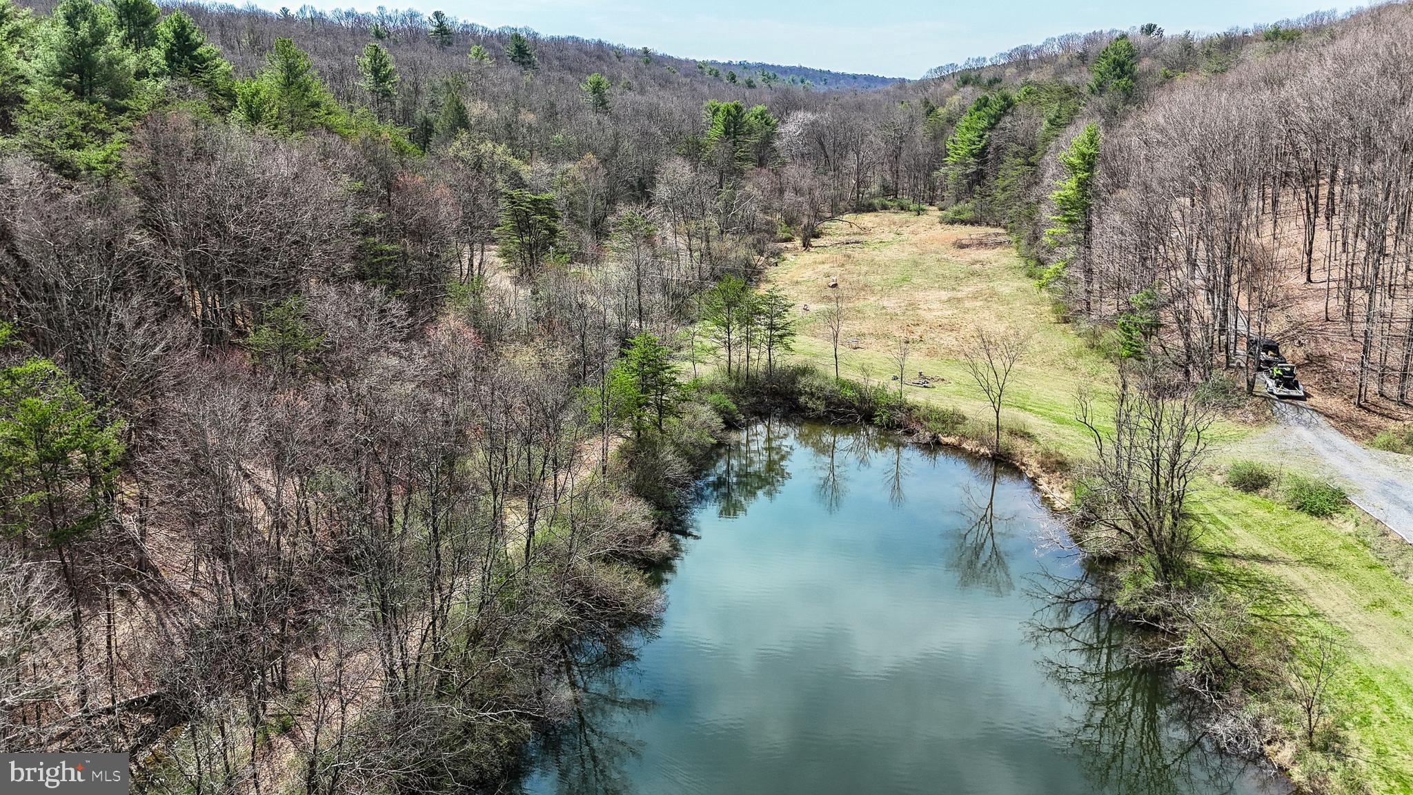 11907 Colyer Lane Shade Gap, PA 17255 - Photo 74 of 87 a view of a lake with mountains in the background