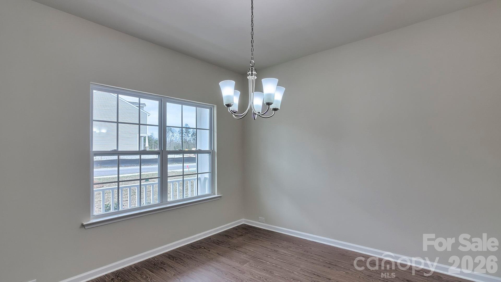109 Piney Wds Road Fletcher, NC 28732 - Photo 8 of 28 a view of a room with windows and chandelier