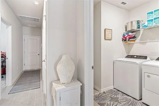 a view of room with washer and dryer