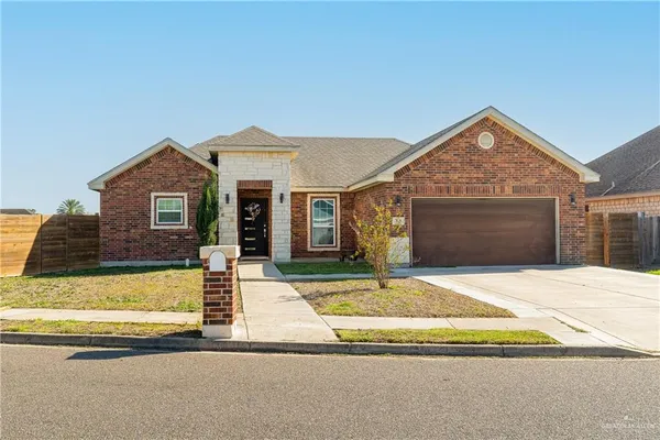 a view of front a house with a outdoor space