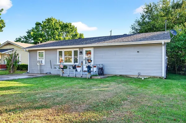 a view of a backyard with a garden