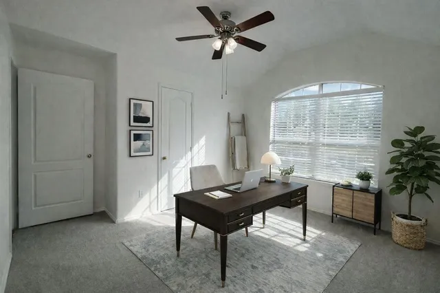 a room with furniture and a window