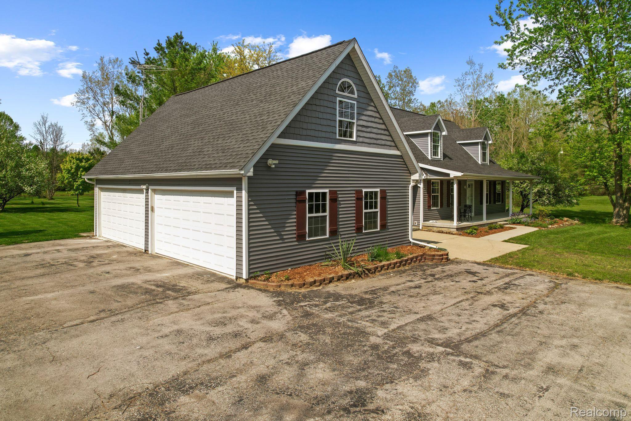 8312 Lambs Road Goodells, MI 48027 - Photo 3 of 46 Attached 3+ car garage