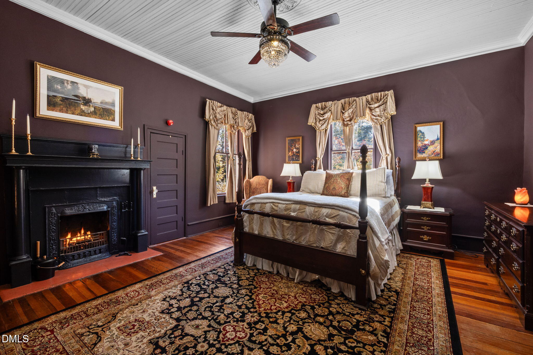 7891 Boston Road Roxboro, NC 27574 - Photo 17 of 85 a bedroom with a bed and a fireplace