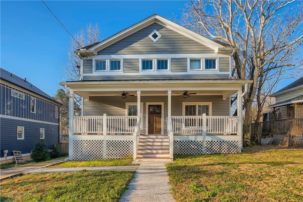 1875 Flat Shoals Road Southeast Atlanta, GA 30316 - Photo 1 of 1 a front view of a house with a yard
