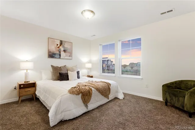 a view of a lake with furniture