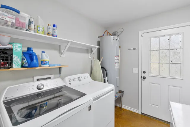 a utility room with dryer and washer
