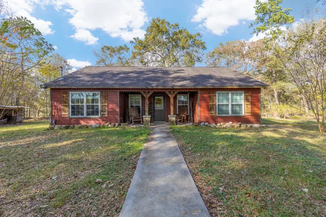 front view of a house with a yard