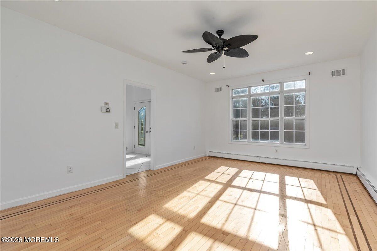 257 Ford Road Howell, NJ 07731 - Photo 19 of 45 a view of an empty room and a window