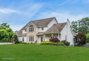 257 Ford Road Howell, NJ 07731 - Photo 41 of 45 a view of a yard in front of a house
