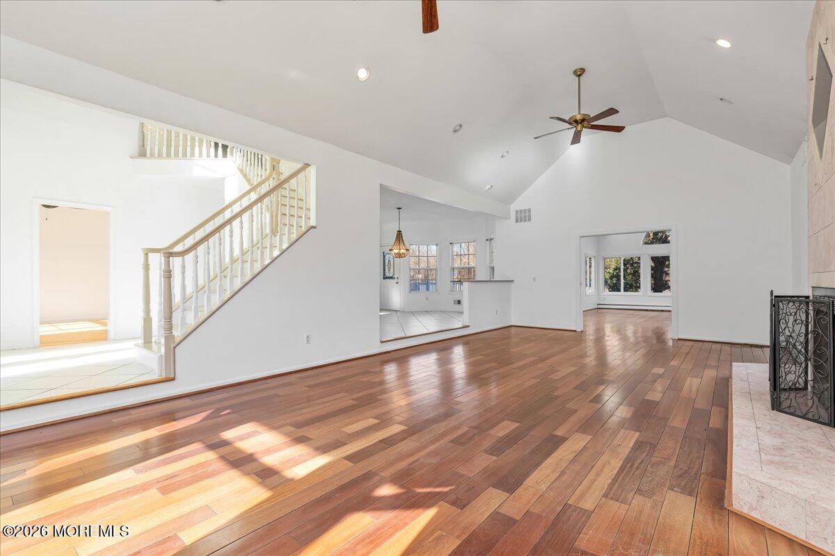 257 Ford Road Howell, NJ 07731 - Photo 6 of 45 a view of kitchen and hall with wooden floor