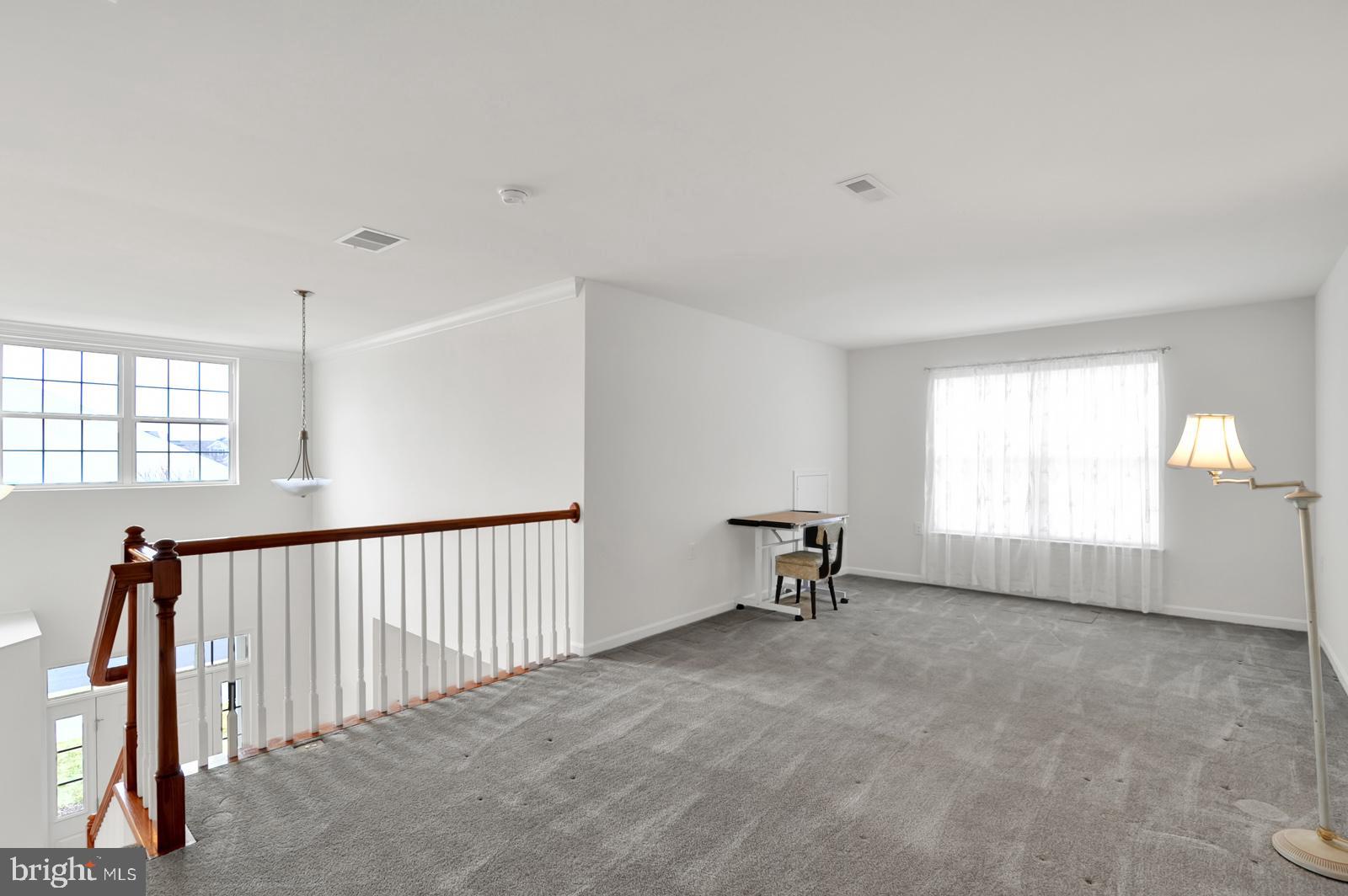 37 Spring Arbor Drive Middletown, DE 19709 - Photo 23 of 37 a view of an empty room with a window