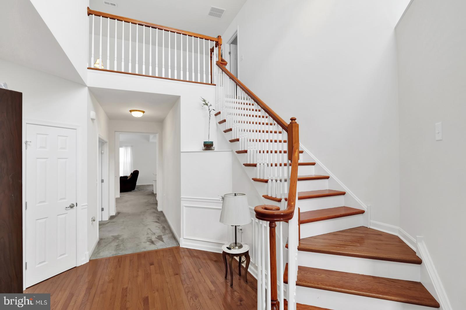 37 Spring Arbor Drive Middletown, DE 19709 - Photo 4 of 37 a view of entryway with wooden floor and stairs