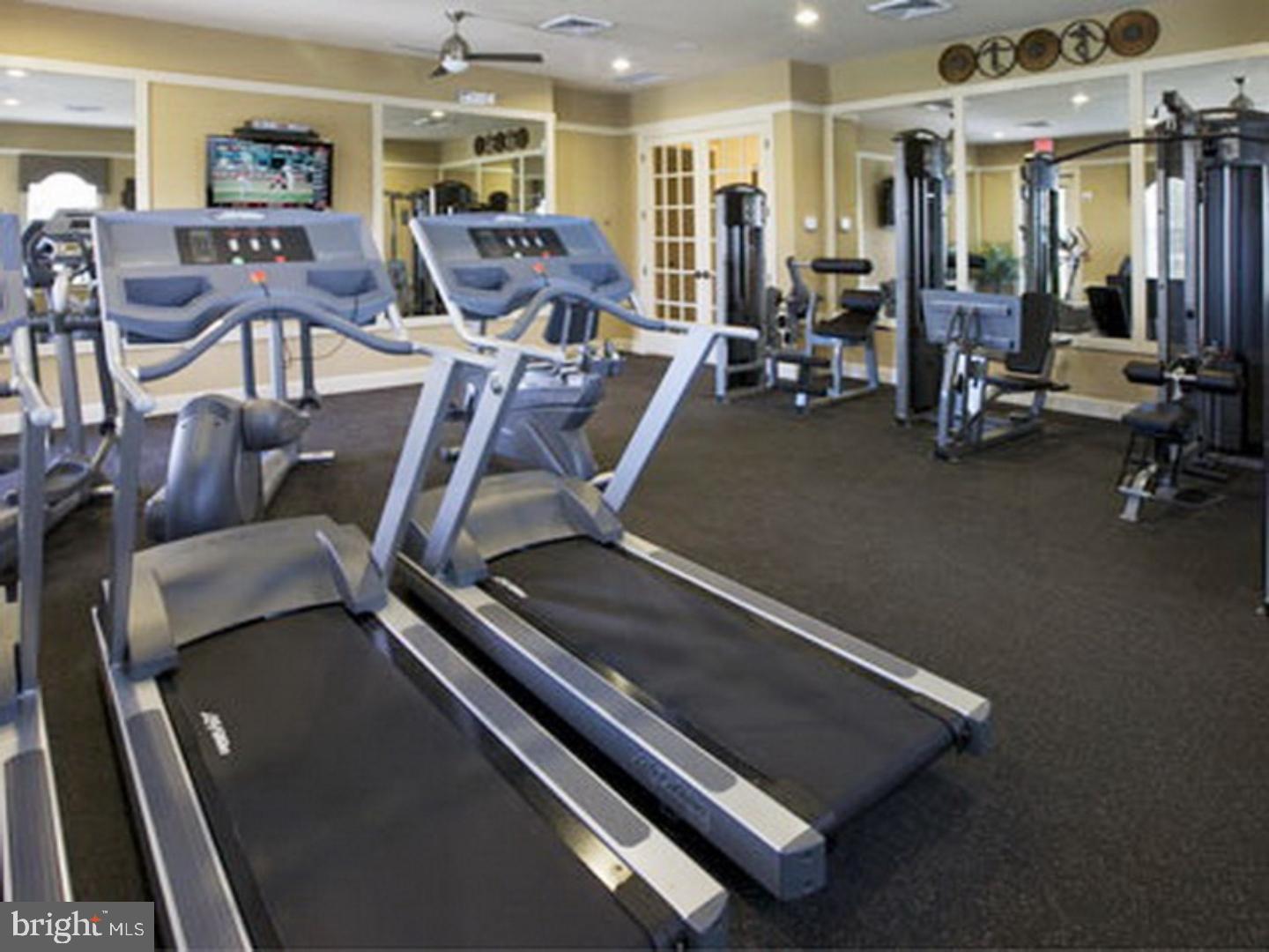 37 Spring Arbor Drive Middletown, DE 19709 - Photo 31 of 37 a view of a room with gym equipment