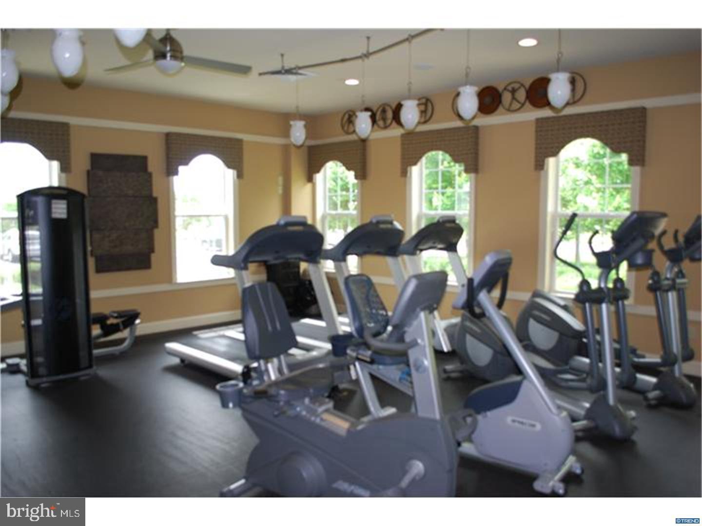 37 Spring Arbor Drive Middletown, DE 19709 - Photo 32 of 37 a view of a dining room with furniture and a floor