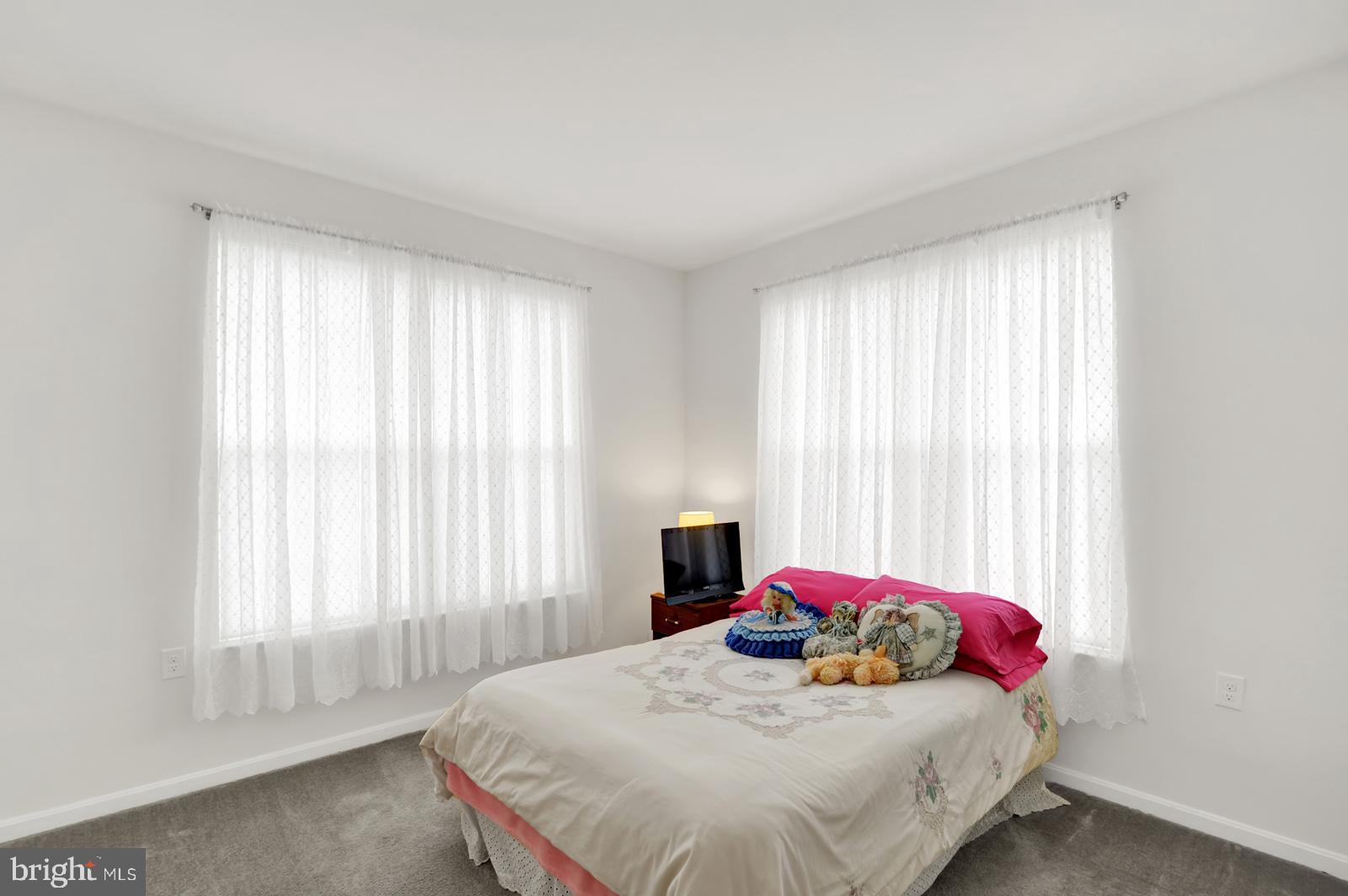 37 Spring Arbor Drive Middletown, DE 19709 - Photo 5 of 37 a bedroom with a bed and window