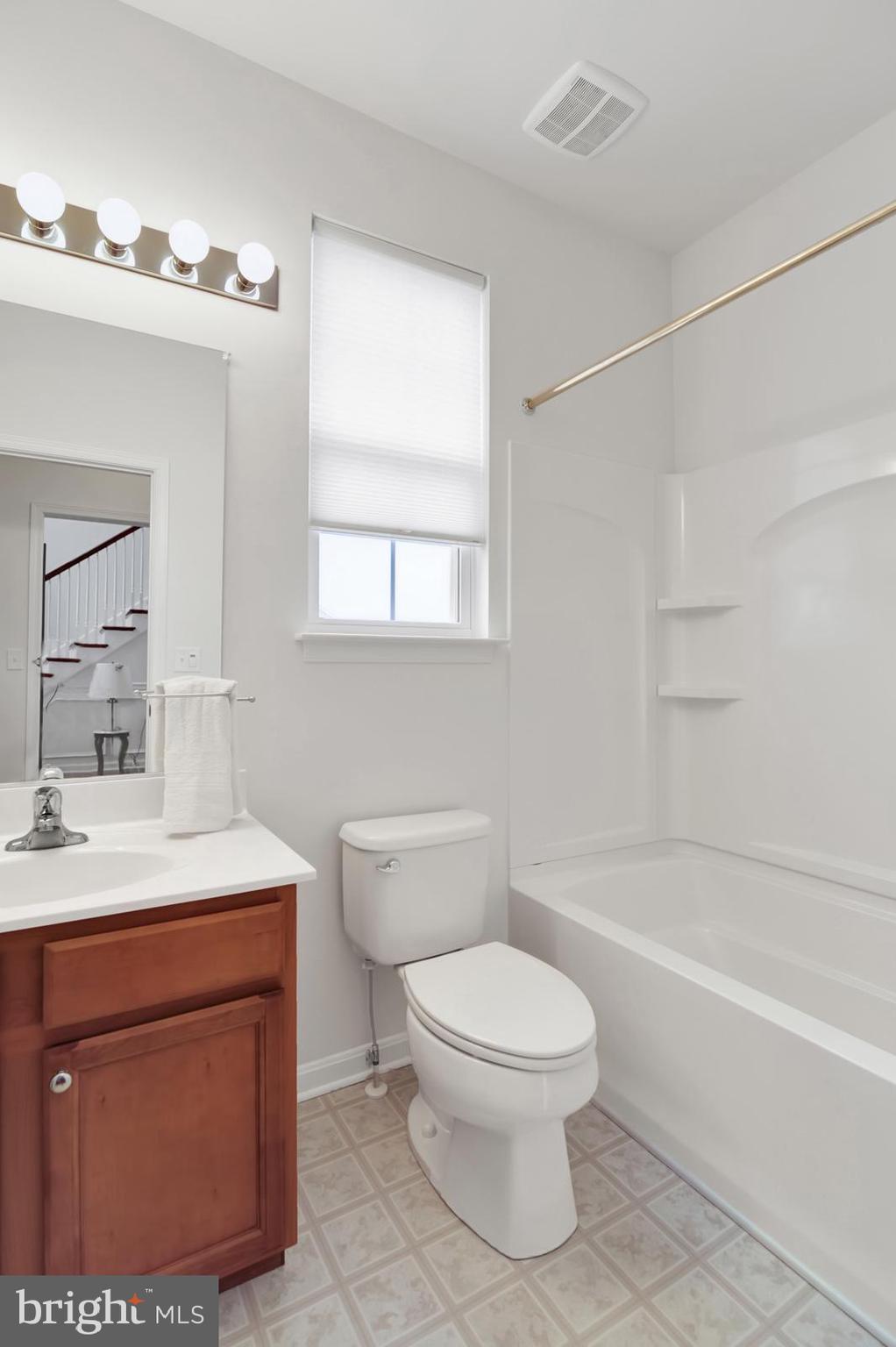 37 Spring Arbor Drive Middletown, DE 19709 - Photo 6 of 37 a bathroom with a sink a toilet and shower