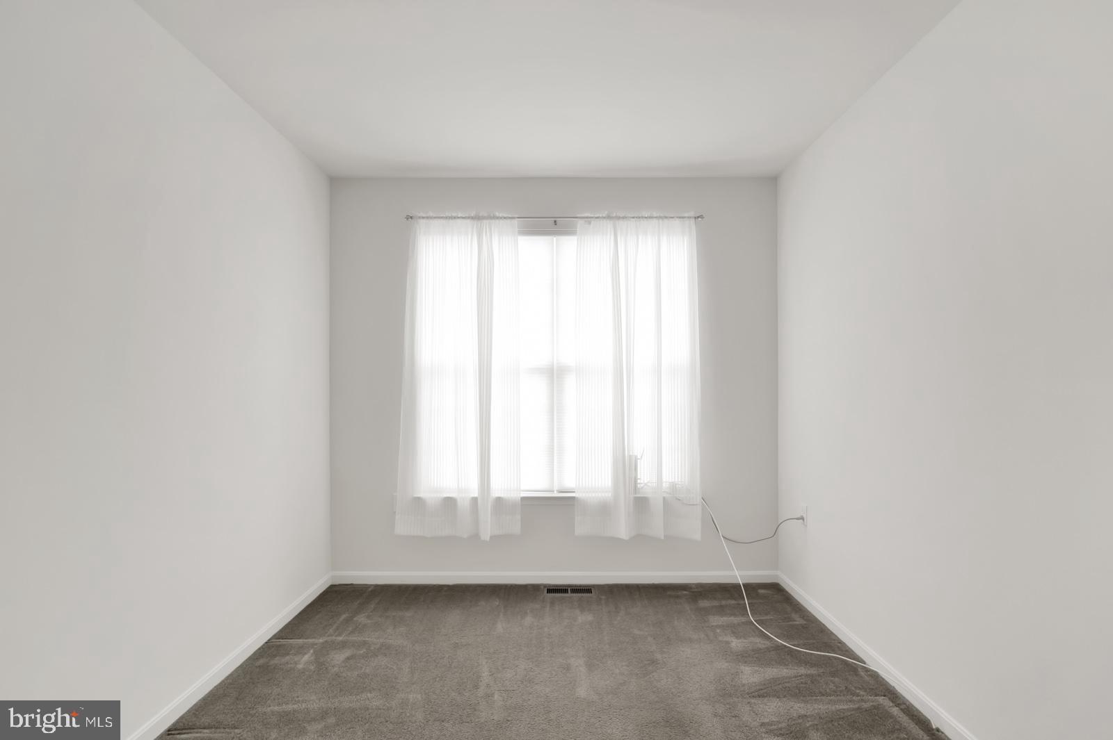 37 Spring Arbor Drive Middletown, DE 19709 - Photo 7 of 37 an empty room with a window